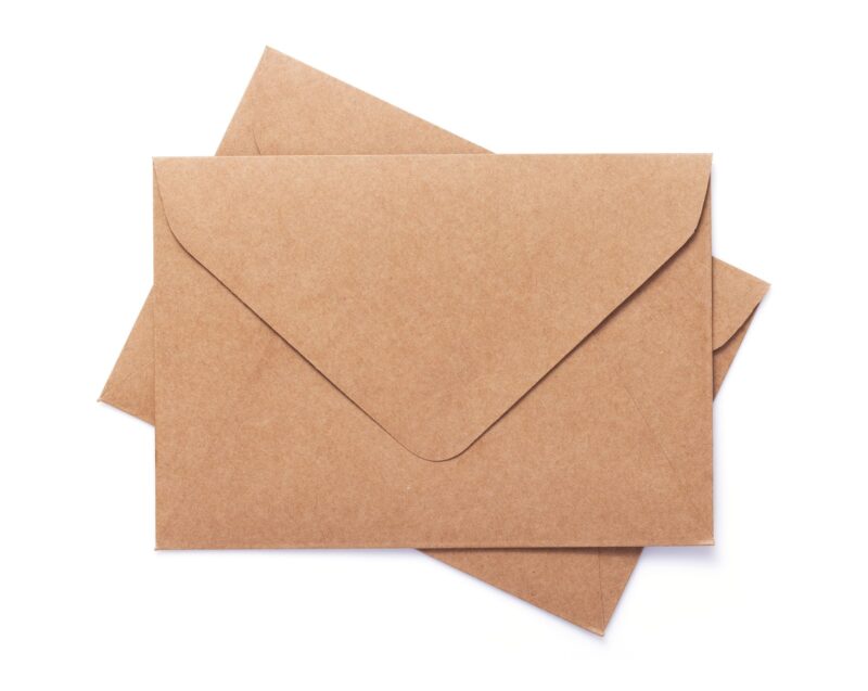 cardboard postal envelope isolated on white